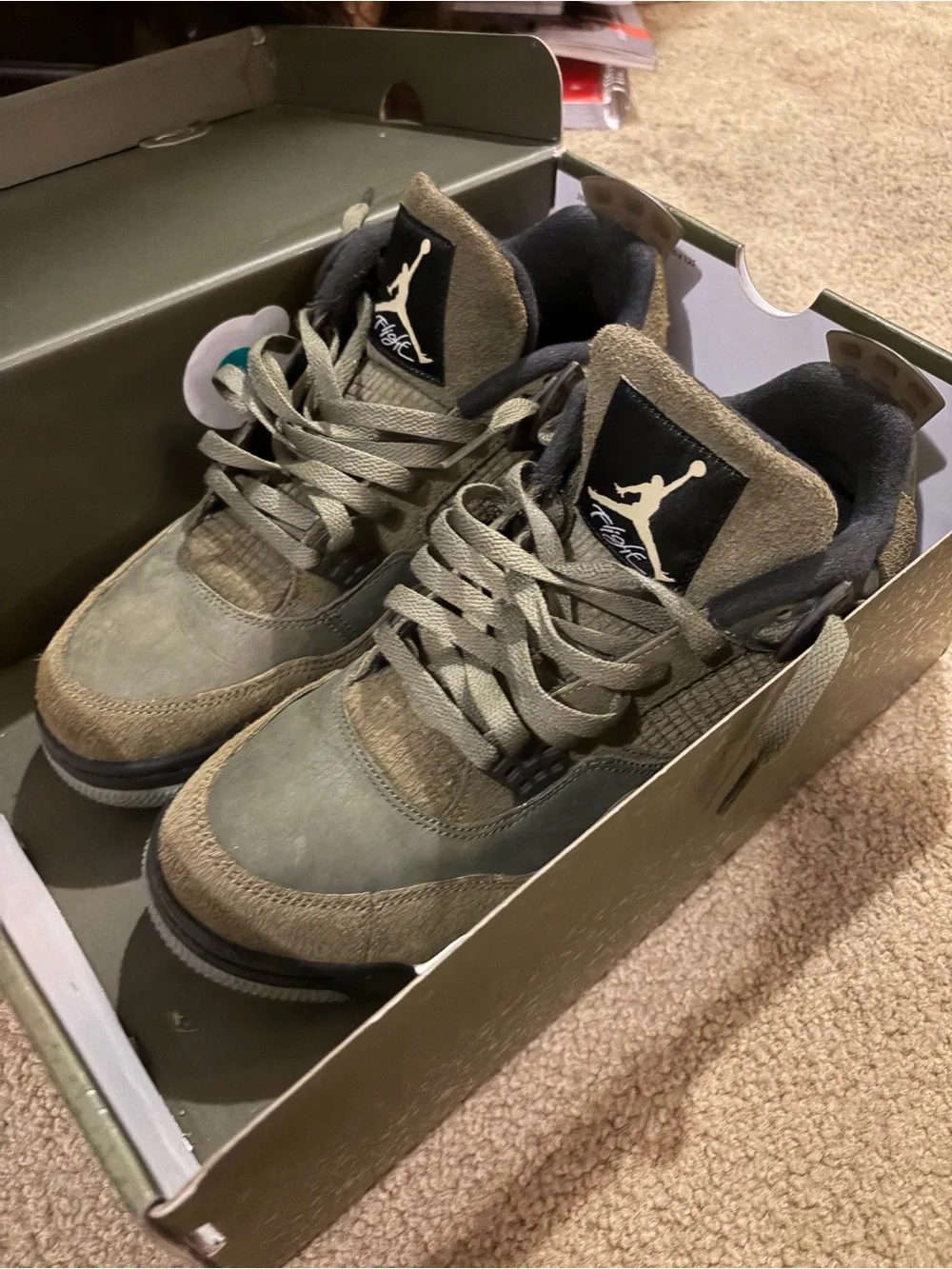 Jordan box in olive green with white label